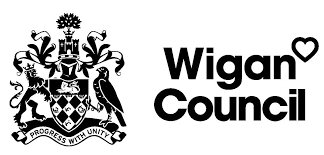 Wigan coat of arms reads progress with unity and includes a lion and a bird of prey, a shield and a emall tree. Words Wigan Council appear alongside a small heart in the top right hand corner.